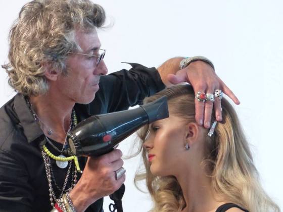 World-renowned stylist, Bruno Weppe, working with a model